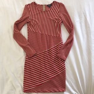 Bebe body con long sleeve dress.  Red & tan